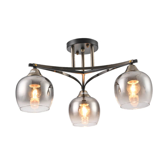 Геометрическая люстра в виде звезды с серым шаром и черно-бронзовым креплением, идеально подходит для современной гостиной.