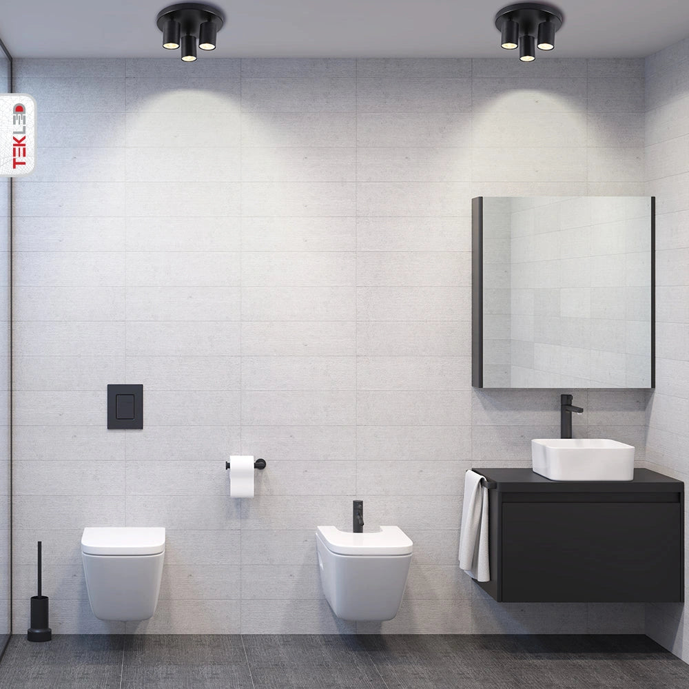 Трехточечный черный спот светильник с круглым подвесом, идеален для современных офисов и жилых помещений.