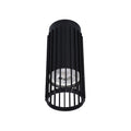 Modern black cylinder downlight with visible bulb. Contemporary design for stylish interior lighting solutions.
