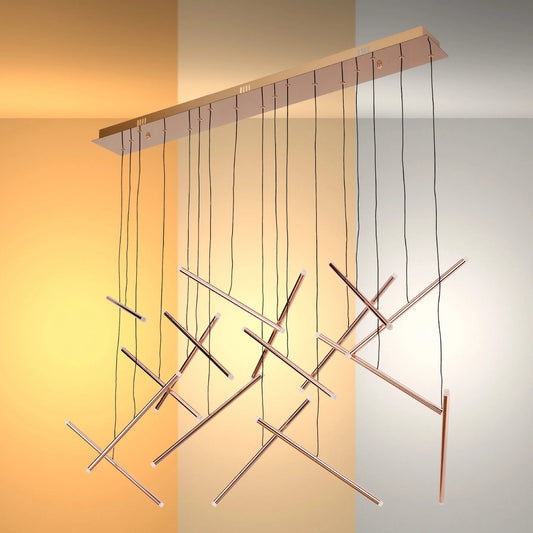 A stylish rose gold pendant light with thin, intersecting tubes suspended from a rectangular ceiling plate by delicate black cables.