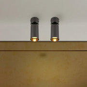Rotatable GU10 surface-mounted spotlight illuminating a modern kitchen with sleek decor, adding style and functionality to the space.172-030282