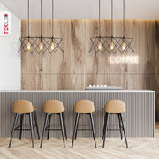 Black metal caged island chandelier with 3xe27 fitting in indoor setting bar island top