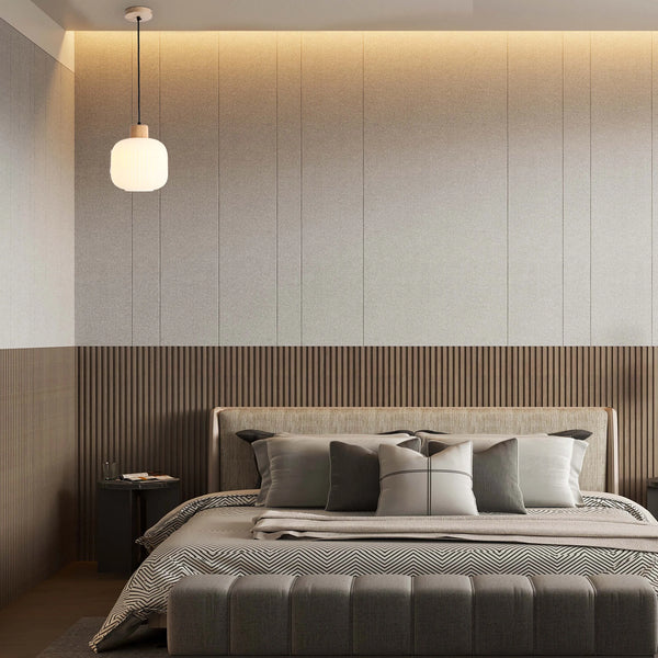 Contemporary bedroom lighting features a single pendant lamp, plus ambient light from hidden ceiling fixtures.