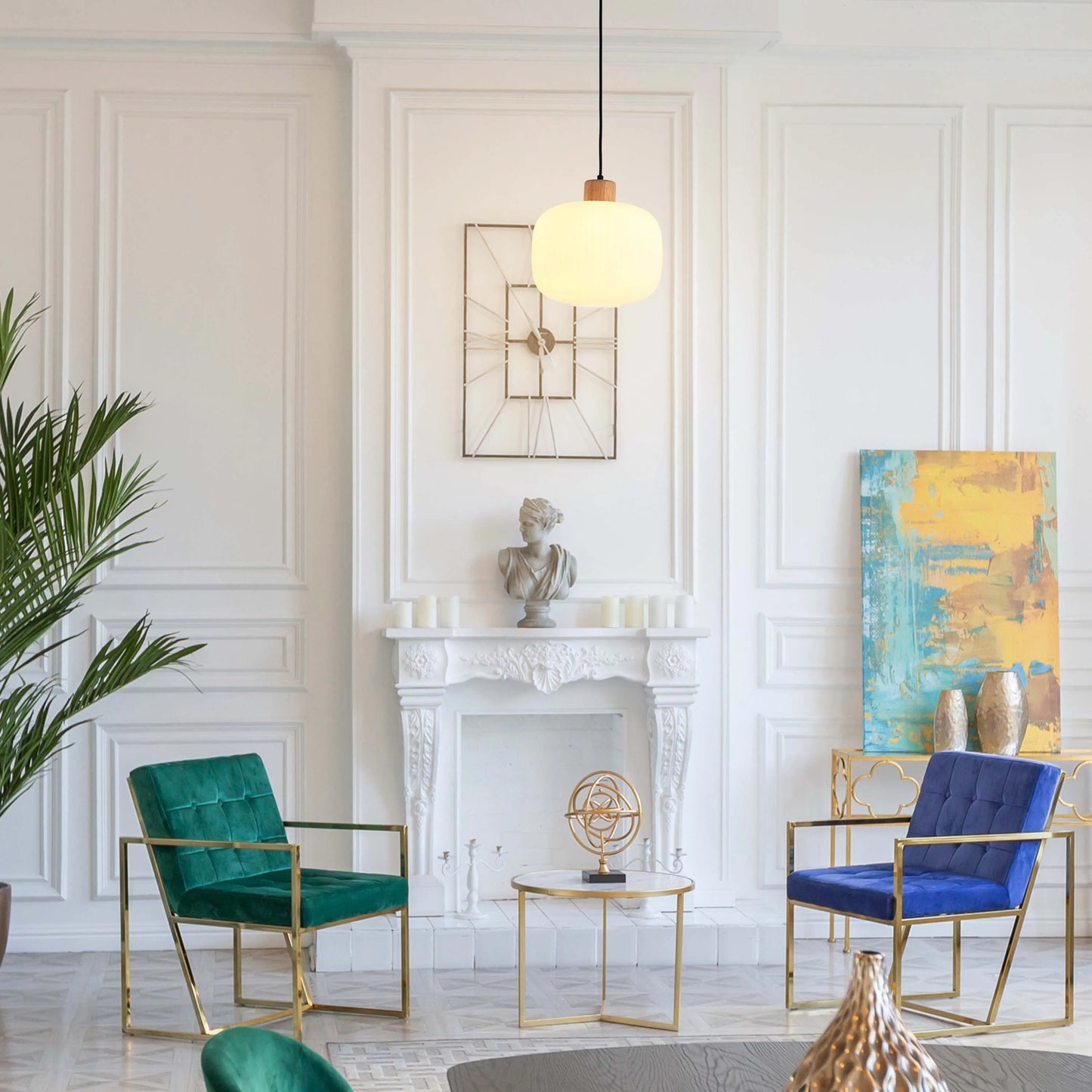 The interior features a modern pendant light, casting a warm glow. It complements the opulent decor and bright room setting.